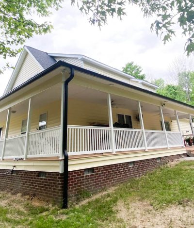 A home with newly installed gutters, highlighting the seamless integration and professional finish.