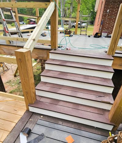 A newly installed deck with modern design and quality materials, featuring ample space for outdoor living.