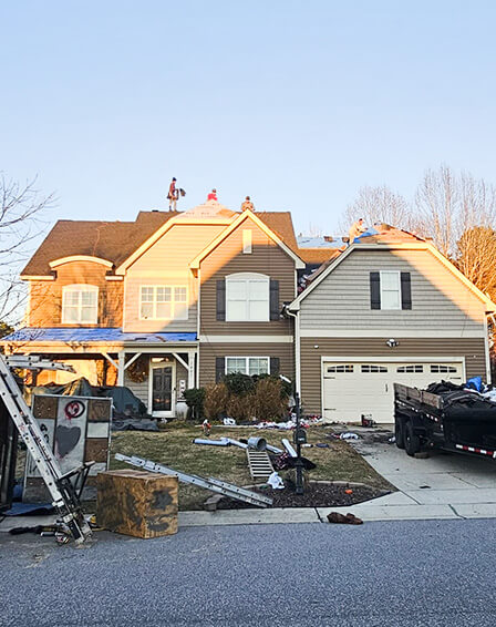 A large home with a newly installed, fully equipped roof featuring advanced materials and complete coverage.