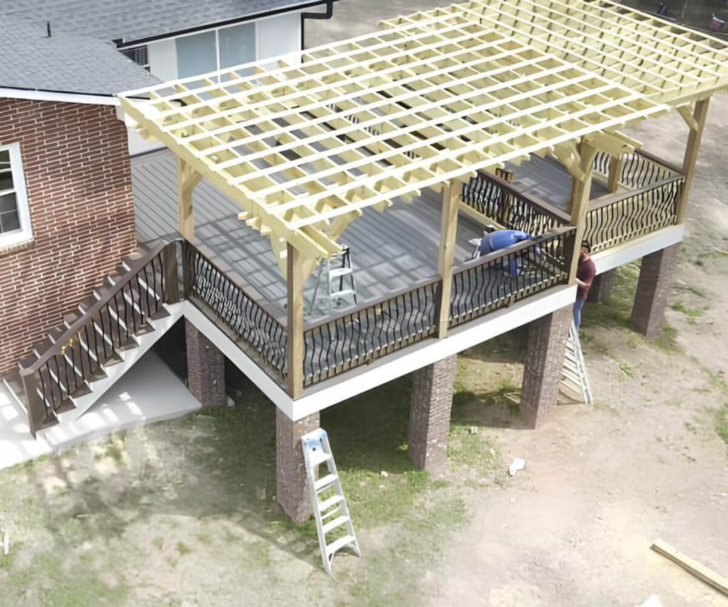 A newly installed pergola in a home’s outdoor space, featuring a stylish design that provides shade and enhances the area’s aesthetic appeal.