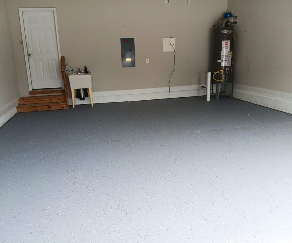 A newly installed epoxy floor with a glossy, seamless finish, showcasing durability and a sleek, modern appearance.