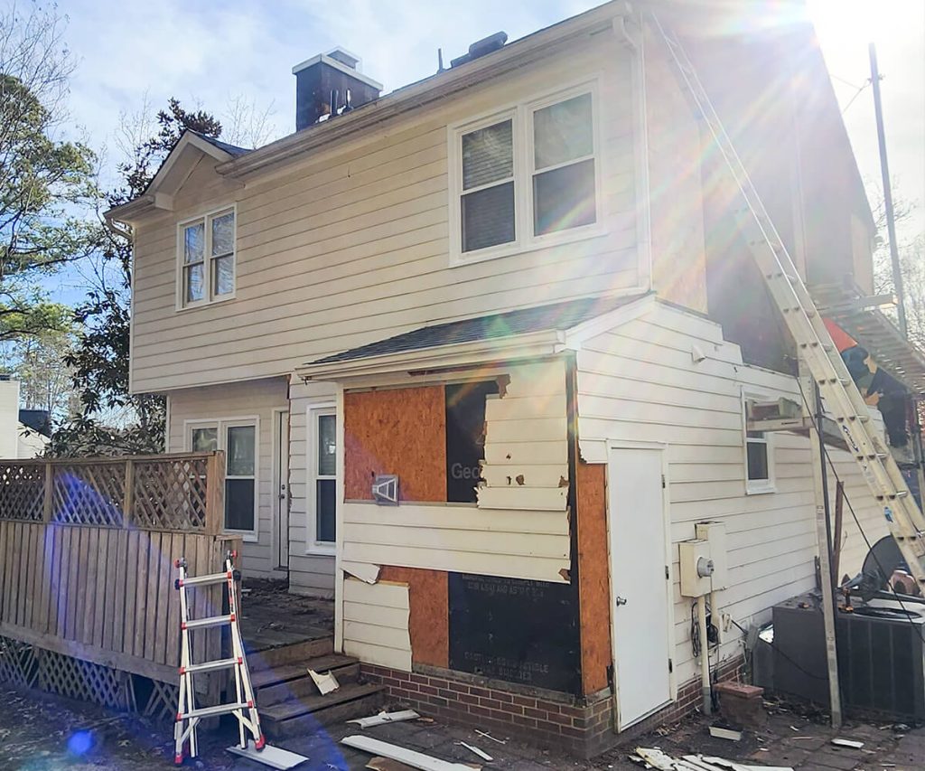 A home with newly installed siding, showcasing a modern and refreshed exterior with clean lines and updated materials.